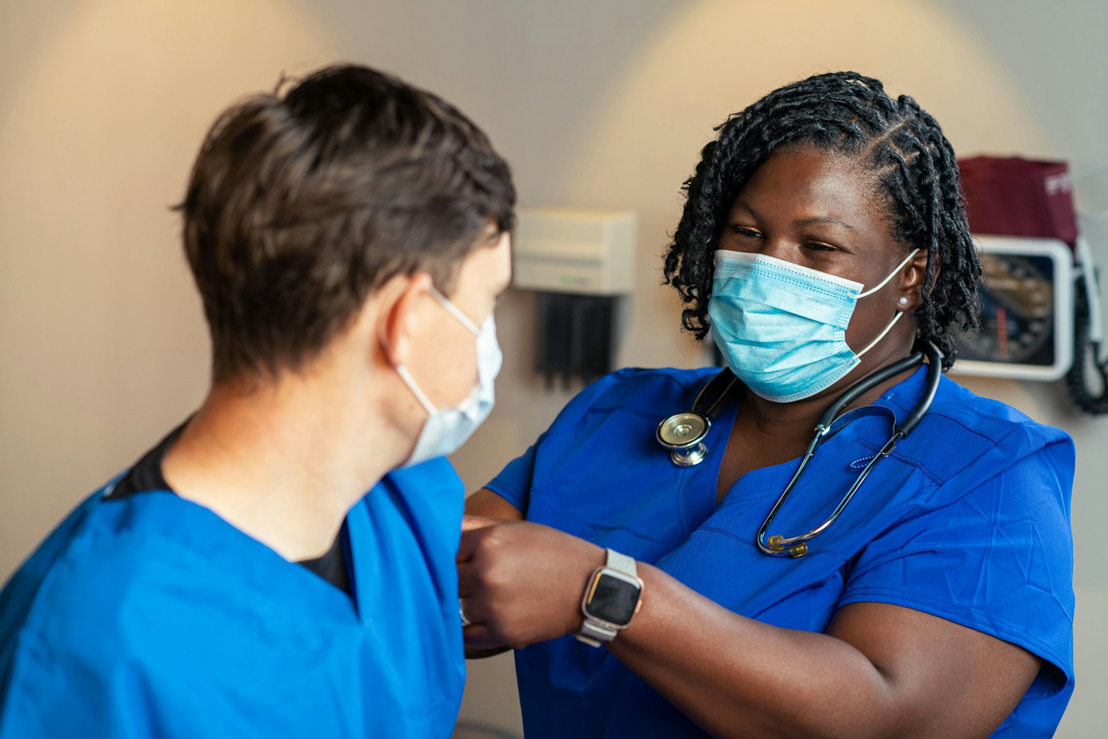 Two healthcare professionals consulting together